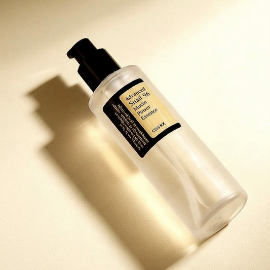 Cosrx Snail Revive Moisturizing Essence bottle with pump, snail mucin for repairing skin and soothing irritation.